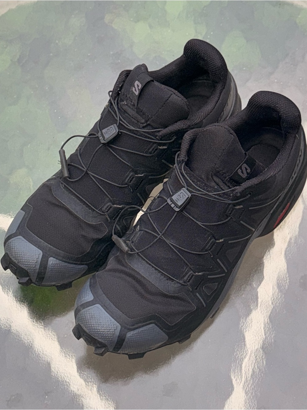 Salomon Black Trail Running Shoes with Gray Accents